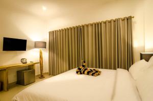 Blue Marlin Dive Resort Trawangan客房内的一张或多张床位