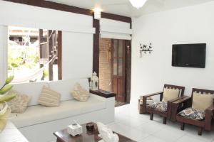 Televisyen dan/atau pusat hiburan di Apart Hotel Pet Friendly em Búzios