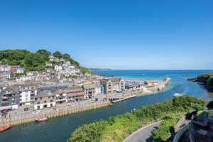 a view of a town next to a river at 2 Bed in Looe oc-l30069 in Looe