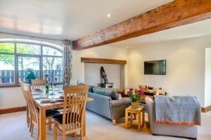 a living room with a table and a couch at 2 Bed in Thwing oc-t29012 in Thwing