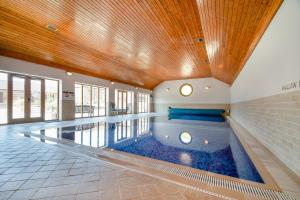 a large swimming pool in a building with a ceiling at 2 Bed in Thwing oc-t29012 in Thwing