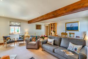 a living room with a couch and chairs at 2 Bed in Thwing oc-t29012 in Thwing