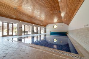 a swimming pool in the middle of a building at 4 Bed in Thwing oc-t29013 in Thwing