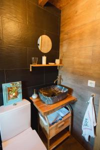 a bathroom with a sink and a toilet in it at Casa do Cancelo in Mondim de Basto +29 photos