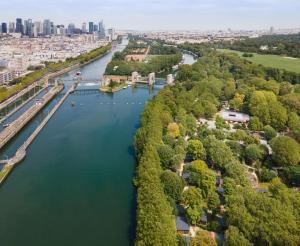 an aerial view of a river with a city at CityKamp Paris in Paris