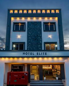 a hotel elite with lights on the front of a building at Hotel ELITE Rameswaram in Rāmeswaram