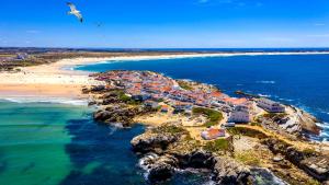 an aerial view of a beach with a resort at Baleal Beach Stay in Baleal +20 photos