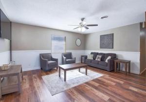 a living room with a couch and a table at Pawnee Duplex in Chattanooga Unit 1 in Chattanooga