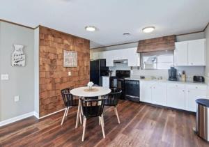 a kitchen with a table and chairs in a room at Pawnee Duplex in Chattanooga Unit 1 in Chattanooga