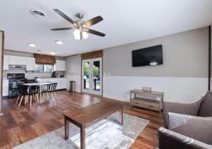 a living room with a couch and a ceiling fan at Pawnee Duplex in Chattanooga Unit 1 in Chattanooga