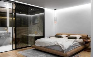 a bedroom with a bed and a glass shower at Superb 2 Bed Apartment in George Town +17 photos