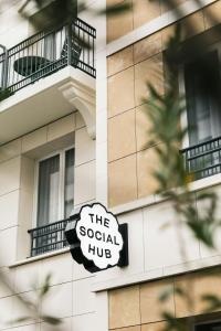 a sign on the side of a building at The Social Hub Paris La Défense in Puteaux