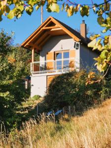 a house on the side of a hill at Weinloft III by Weinlofts in Eisenberg an der Pinka