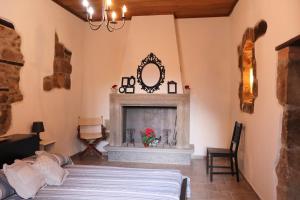 a bedroom with a bed and a fireplace at Casa Margherita in Bolsena