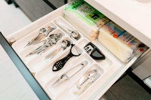 a drawer with scissors and other items on it at ステラガーデン in Kami-furano