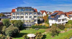 an aerial view of a large white building at Landhaus Müller in Immenstaad am Bodensee