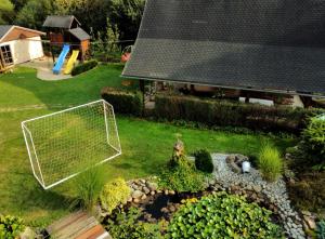 an aerial view of a yard with a soccer goal at Country House Liptov in Svätý Kríž