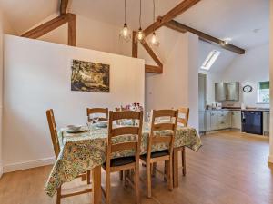 a kitchen and dining room with a table and chairs at 3 Bed in Ashbourne oc-94309 in Windley