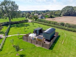 an overhead view of a house in a field at 1 Bed in Leominster oc-93060 in Pembridge