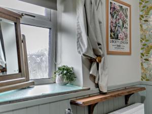 a window in a bathroom with a bench next to a window at 2 Bed in Buxton oc-95993 in Hartington +20 photos