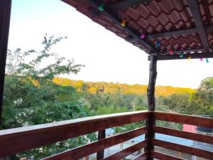 a view from the deck of a tree house at Casa tierno amanecer in Xpujil