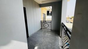 a view of a balcony with a railing on a building at Prime Ville in Rubuchi