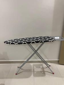 a table with a black and white pattern on it at شـقـة بغـرفـتـيـن Two rooms in Al Kharj