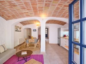 a living room with a couch and a table at Apartment at Cadaqués Church in Cadaqués