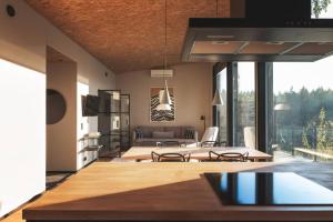 a living room with a couch and a table at Stay North - Kajastus in Salo