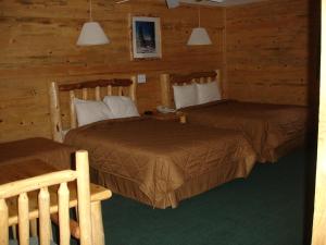 Postel nebo postele na pokoji v ubytování Georgetown Mountain Inn