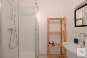 a bathroom with a shower and a sink at La Maison de Pêcheurs in Cancale +23 photos