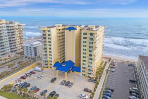 an aerial view of a building near the ocean at Beachfront Condo with Spacious Balcony in Daytona Beach