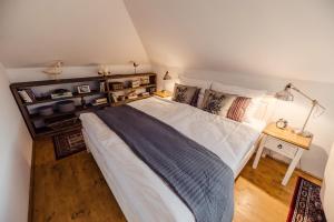 מיטה או מיטות בחדר ב-Pension Zwicker