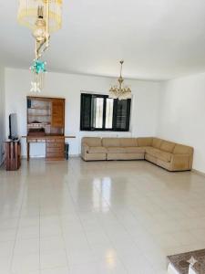 a large living room with a couch and a table at Villa Vit The Adriatic Experience in Vasto