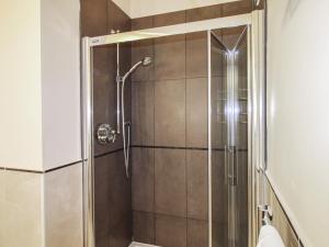 a shower with a glass door in a bathroom at 16 Bolt Head in Salcombe +29 photos