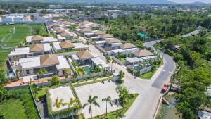 an aerial view of a residential estate at Trichada Essence in Ban Pak Lak