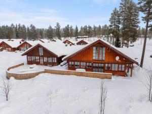 a cabin in the snow with snow covered ground at Ljøratunet Storhytte in Ljørdalen
