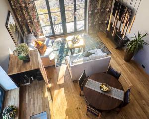 an overhead view of a living room with a table at Lossipark Guest Apartments - vis-à-vis Bishop's Castle in Haapsalu