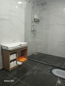 a bathroom with a shower and a sink at Hotel Efesian B&B City Center - Harbour in Kuşadası +33 photos