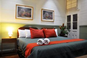 Ένα ή περισσότερα κρεβάτια σε δωμάτιο στο Hotel Aranjuez