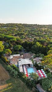an aerial view of a resort with a swimming pool at Hôtel La Tartane Saint-Tropez in Saint-Tropez