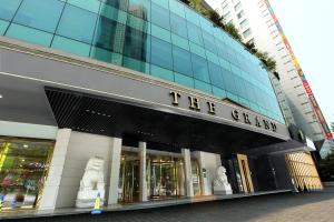 a store front of a building with a sign on it at Daegu Grand Hotel in Daegu