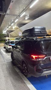 a car is parked in a parking lot with its luggage at Wallace in São Paulo