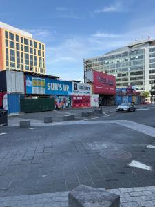 an empty parking lot in a city with buildings at Downtown house w On-site Parking Walk to Capital, Museums B in Washington, D.C.