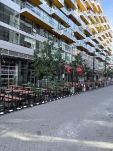 an empty street in front of a building at Downtown house w On-site Parking Walk to Capital, Museums B in Washington, D.C.
