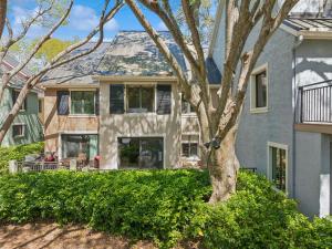 a house with a tree in front of it at 803 Clipper Court in Hilton Head Island