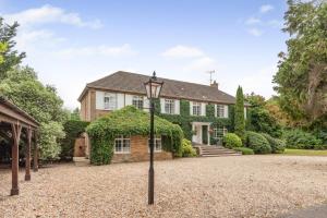 a house with a street light in front of it at 4 Bed in Bray oc-b32610 in Bray