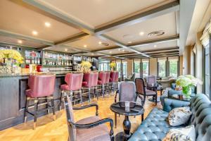 a bar with a row of chairs and a counter at 4 Bed in Bray oc-b32610 in Bray