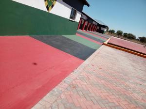a building with colorful paint on the side of it at Kimberly in Goodwood