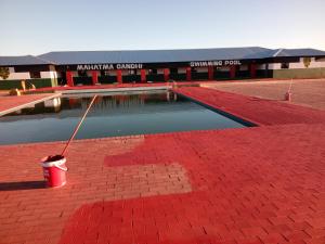 a pool of water in front of a building at Kimberly in Goodwood